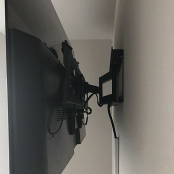 Denver Sight and Sound - This is what Chad did: moved/coiled the cords neatly w/ several rubber ties on top of the tv bracket. Full motion mount - Home Theatre Installation Near Me - Castle Pines, Colorado