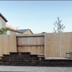 The Biggest Little Yard - Outdoor lights and standing wall with cap