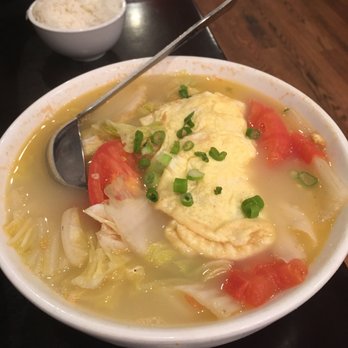 Peppercorns Kitchen - epic egg and tomato soup with freshly made knife-cut noodles - Szechuan Near Me - Evanston, Illinois Peppercorns Kitchen - epic egg and tomato soup with freshly made knife-cut noodles - Szechuan Near Me - Evanston, Illinois