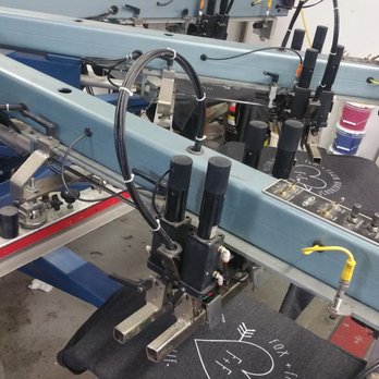 Thread Monster - One of our presses in action, this baby can print up to 700 shirts per hour! - Screen Printing/T-Shirt Printing Near Me - Concord, California Thread Monster - One of our presses in action, this baby can print up to 700 shirts per hour! - Screen Printing/T-Shirt Printing Near Me - Concord, California