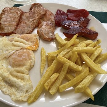 Café de Pombo - Pork chop dish. - Coffee & Tea Near Me - Santander, S