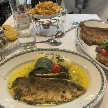 Brasserie Lipp Restaurant - Lake lucerne fish with lemon butter sauce, potato's and spinach; Schnitzel - Brasseries Near Me - Geneva, GE Brasserie Lipp Restaurant - Lake lucerne fish with lemon butter sauce, potato's and spinach; Schnitzel - Brasseries Near Me - Geneva, GE