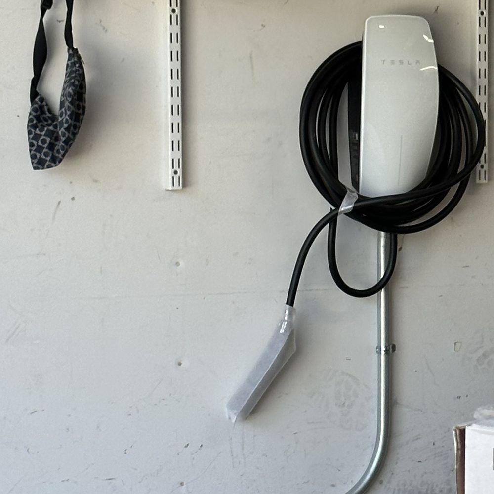 Tesla wall charger with conduit installation