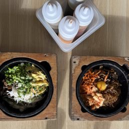 Hot Stone Bulgogi bowls with white rice base and five toppings Hot Stone Bulgogi bowls with white rice base and five toppings