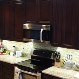 Beautiful Palm Beach Dark Chocolate cabinets finally installed after a huge headache dealing with the store.