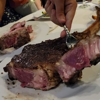 Malbec Grill - "Medium rare" tomahawk steak - Steakhouses Near Me - Parkland, Florida Malbec Grill - "Medium rare" tomahawk steak - Steakhouses Near Me - Parkland, Florida