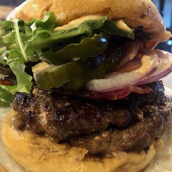 Cubby's - The Dragonslayer ($9.99) - Double Top Sirloin, Bleu Cheese, Smoked Bacon, Tomatoes, Pickles, Mixed Greens, & Buffalo Sauce - New American Near Me - Provo, Utah