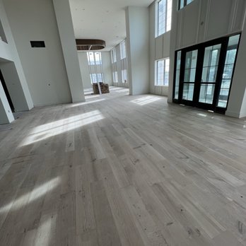 Zapata Floors - HardWood flooring at an Apartment complex's Leasing office, yet to be stained. - Flooring Near Me