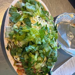 Ask for extra rice/beans if you want, and get half and half meats, check out how loaded this bowl is!