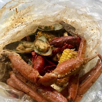Mr and Mrs Crab - Create your own combo with green mussels, snow crabs and crawfish in the special sauce Yesssss!!! - Seafood Near Me - Brandon, Florida Mr and Mrs Crab - Create your own combo with green mussels, snow crabs and crawfish in the special sauce Yesssss!!! - Seafood Near Me - Brandon, Florida