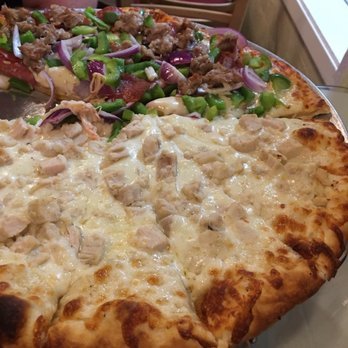 Photo of Four Corners Pizza & Pasta - El Sobrante, CA, United States. Four 4 Corners Special Pizza and four corners 4 Corner's White Pizza