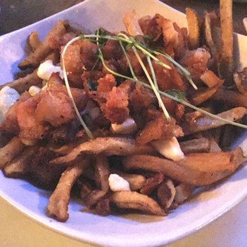 Tavern 1883 - Pork belly poutine - Pubs Near Me - Canmore, Alberta