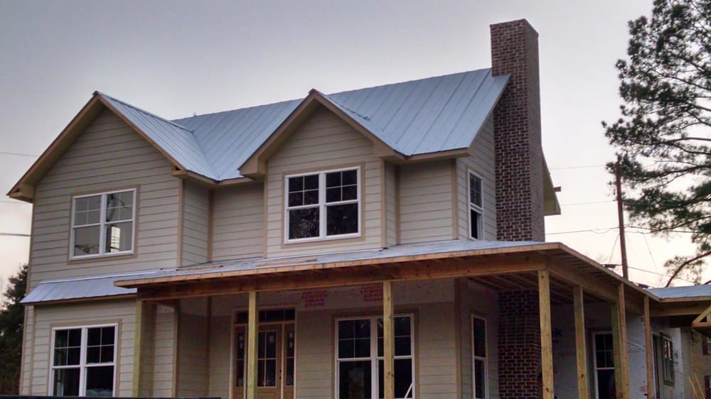 Slide of JC Metal Roofing