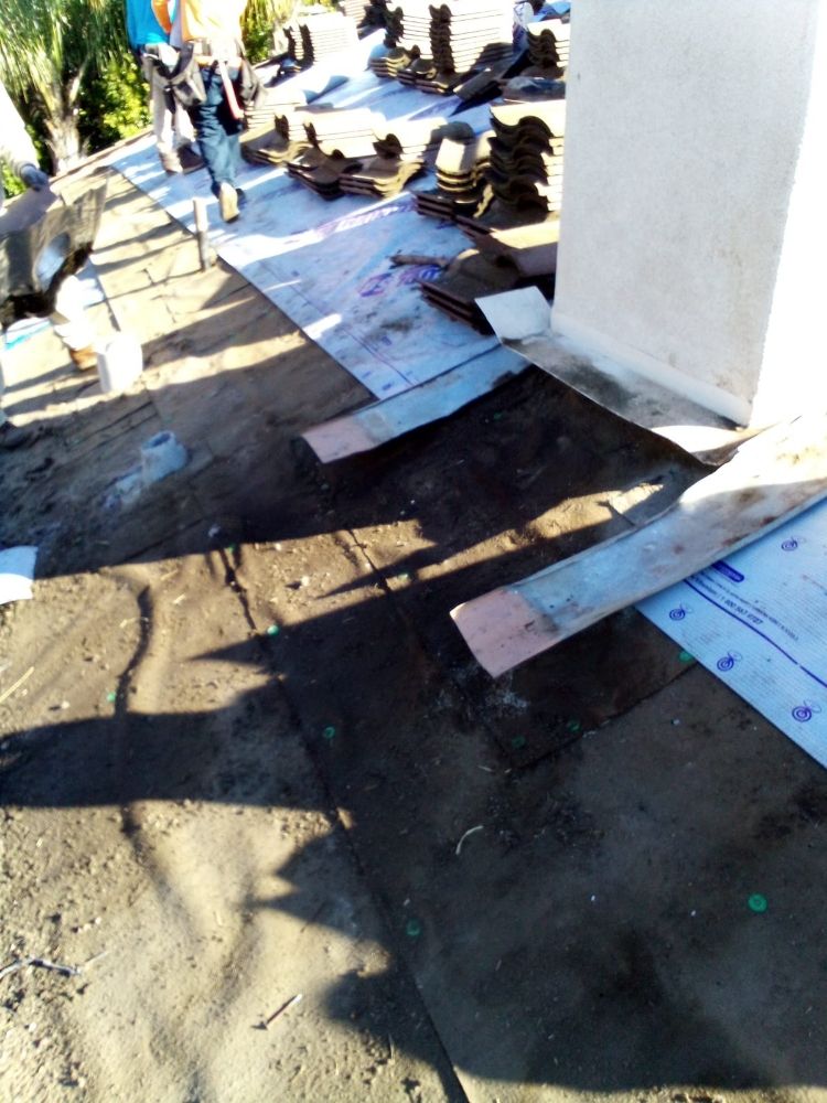 Slide of Roofing Hands Renovations