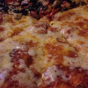 Uncle Tony's - Large pizza half combo and half cheese - Italian Near Me - Valley Glen, California Uncle Tony's - Large pizza half combo and half cheese - Italian Near Me - Valley Glen, California