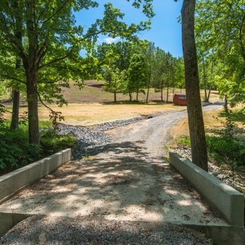 Sullivan Design And Construction - a bridge over a creek - General Contractors Near Me Sullivan Design And Construction - a bridge over a creek - General Contractors Near Me