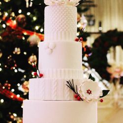 Le Cake Design Studio - White fondant wedding cake with sweater texture embellishments. Of course all deliciously edible!