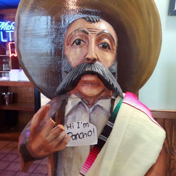 Coyote Rojo # 4 - Poncho greets you at the door! - Mexican Near Me - Spring Hill, Florida