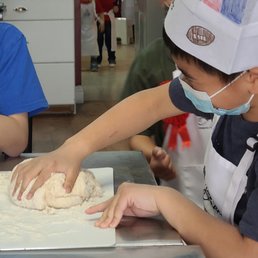 making fresh dough for the pizza