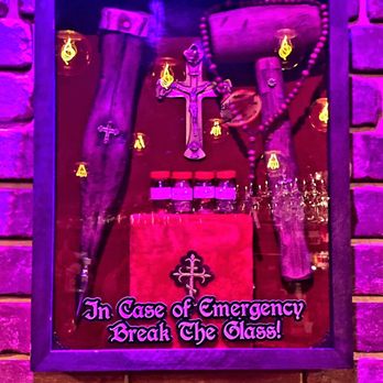 Dracula's Legacy Wine Bar - July 2021: Shadow box w/ the tools of the trade:) - Wine Bars Near Me - St. Petersburg, Florida