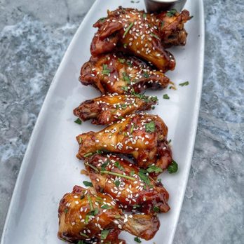 Rock Elm Tavern - STICKY GINGER Wings sauced, hoisin glaze - New American Near Me - Plymouth, Minnesota Rock Elm Tavern - STICKY GINGER Wings sauced, hoisin glaze - New American Near Me - Plymouth, Minnesota