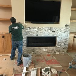 Couture Home - Adding stone to a fireplace