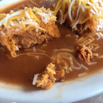 Tamale Kitchen - Inside of red tamale. Nice flavor and good corn wrapper. - Mexican Near Me - Highlands Ranch, Colorado