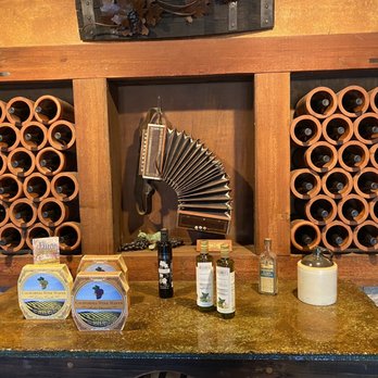 Saluti Cellars - wine bottles and a fan - Venues & Event Spaces Near Me - Somerset, California