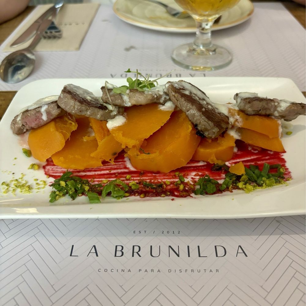 La Brunilda - Grilled Iberian Pork Shoulder. - Tapas Bars Near Me - Seville, SE La Brunilda - Grilled Iberian Pork Shoulder. - Tapas Bars Near Me - Seville, SE