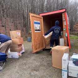 Making Moving Easy - Moving help staff loading the boxes into the U-box