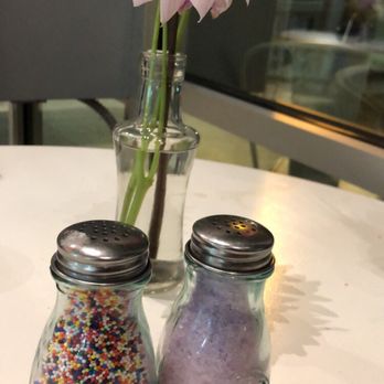 Lady Quack's Cakery - Such cute decor! Love the "salt" and "pepper" shakers- don't think their desserts need added sprinkles but very cute addition to tables. - Custom Cakes Near Me - Austin, Texas