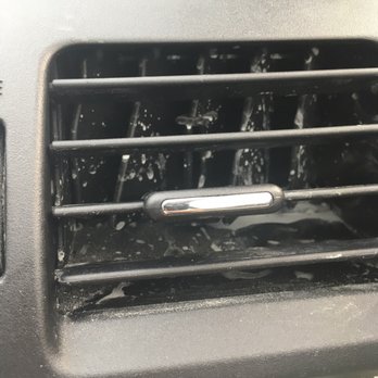 Dentagon Auto Hail Repair - The vents with grey/white dried water. - Body Shops Near Me - Aurora, Colorado