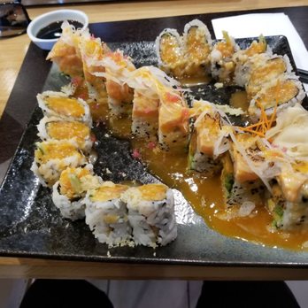 Gozen Sushi - Gozen roll in the middle and two sets of Crispy spicy salmon on both sides - Sushi Bars Near Me - London, Ontario