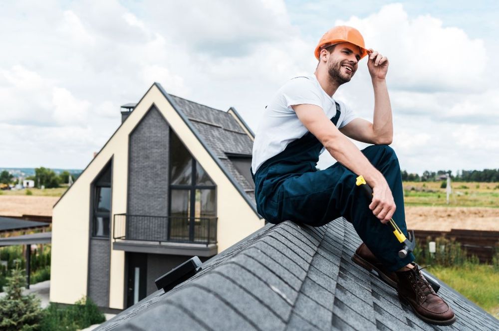 Slide of De La Cruz Roofing