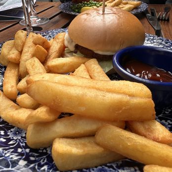 The Sir John Oldcastle - Veggie burger and fries with a side of BBQ sauce - Pubs Near Me - London, XGL The Sir John Oldcastle - Veggie burger and fries with a side of BBQ sauce - Pubs Near Me - London, XGL