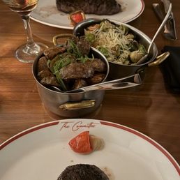 Potatoes Lyonnaise, Brussels Sprouts, Filet Mignon*, Wagyu Strip*