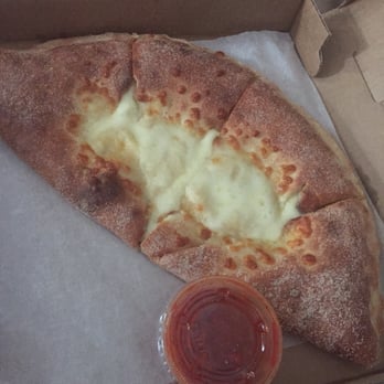 Theo's Pizzeria and Deli - Calzone or cheese stuffed pizza? - Pizza Near Me - Melrose, Massachusetts Theo's Pizzeria and Deli - Calzone or cheese stuffed pizza? - Pizza Near Me - Melrose, Massachusetts