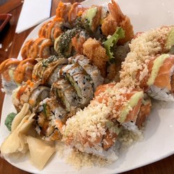 Sapporo East - Front to back: orange flamingo, shrimp tempura, miami spice, aloha