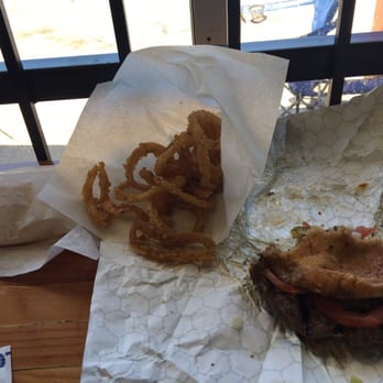 Harvey B's - My half eaten burger and the gift of onion rings. The burger was a mega half pounder...my fur babies had to finish it off later!! - Burgers Near Me - Dallas, Texas Harvey B's - My half eaten burger and the gift of onion rings. The burger was a mega half pounder...my fur babies had to finish it off later!! - Burgers Near Me - Dallas, Texas