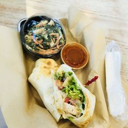 Buffalo Chicken Wrap with a side of buffalo sauce and Spinach and Kale. Amazing