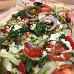 Veggie pizza with pesto and feta. Veggie pizza with pesto and feta.