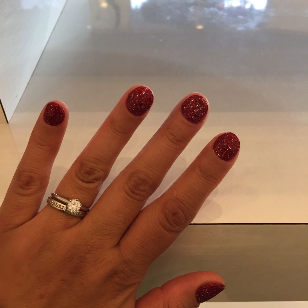 Had dip powder nails done in red. Had dip powder nails done in red.