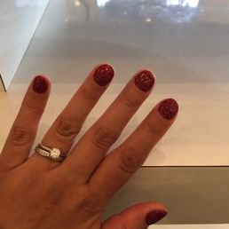 Had dip powder nails done in red. Had dip powder nails done in red.