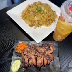 Stone Pho - Chicken fried rice with pork chop on the side and a tropical tea