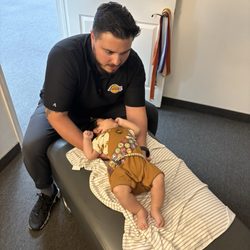La Habra Chiropractic Group & Rehab - Dr. Patron working on 3 month old baby involved in a car accident