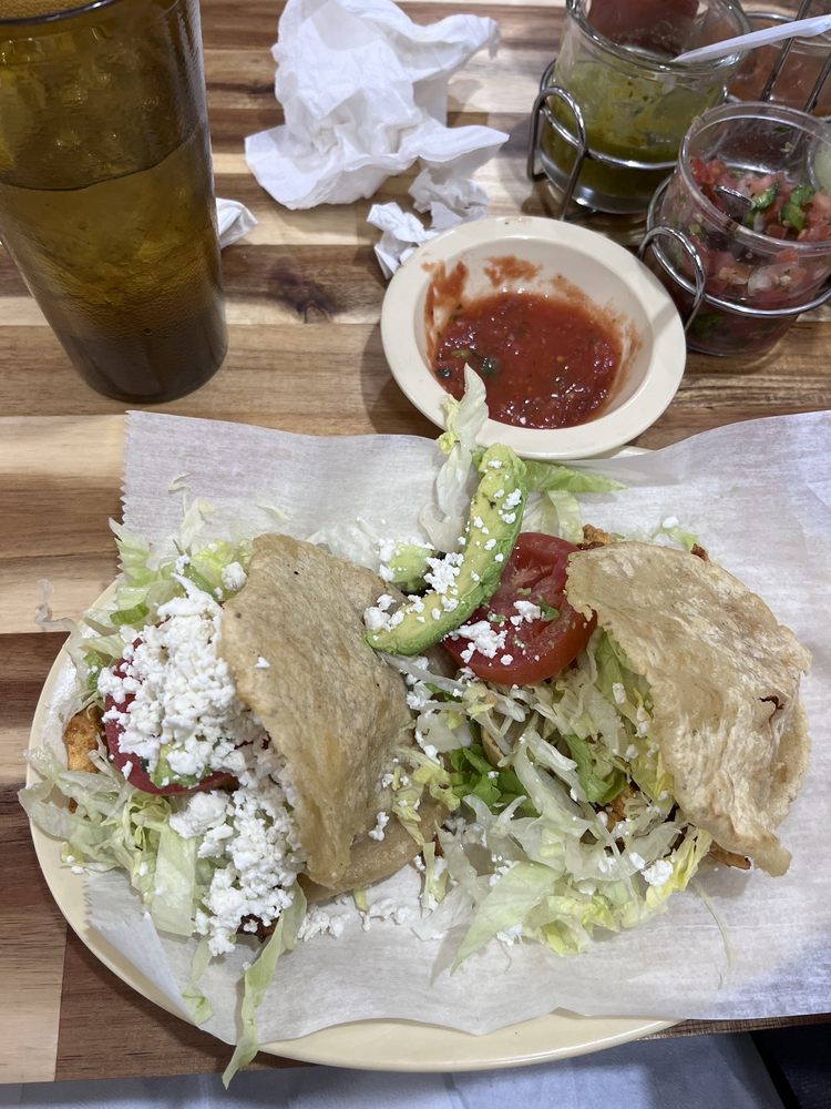 La Mexicana Supermarket and Restaurant Logo