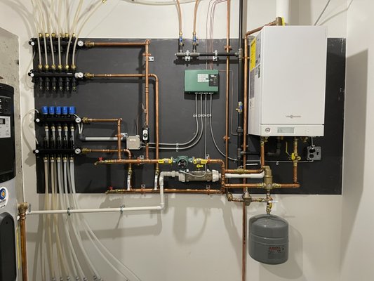 Wolfe Plumbing & Heating Logo
