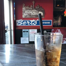 a cold drink on a table a cold drink on a table