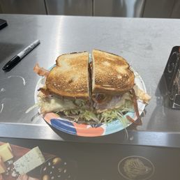 Deli Sub   - Sourdough bread  - chipotle chicken  - Chipotle Mayo  - Provolone  - Bacon  - lettuce  - Jalapeño - Onions