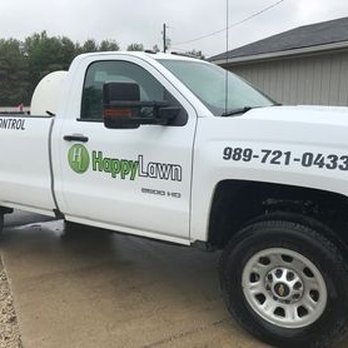 Happy Lawn - Loading up one of our trucks for some mosquito spraying. - Lawn Services Near Me - Gladwin, Michigan Happy Lawn - Loading up one of our trucks for some mosquito spraying. - Lawn Services Near Me - Gladwin, Michigan